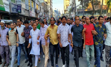 এ কে আজাদকে গ্রেপ্তারের দাবিতে ফরিদপুরে বিক্ষোভ মিছিল