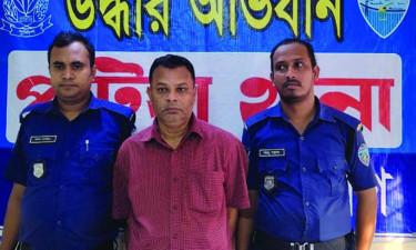 ৫৭ মামলার সাজাপ্রাপ্ত পলাতক আসামি মোহাম্মদ রুহুল আমিন গ্রেপ্তার